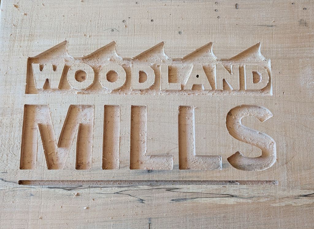 Woodland Mills logo detail